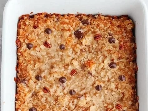 Delicious easy German chocolate cookie bars topped with coconut and nuts