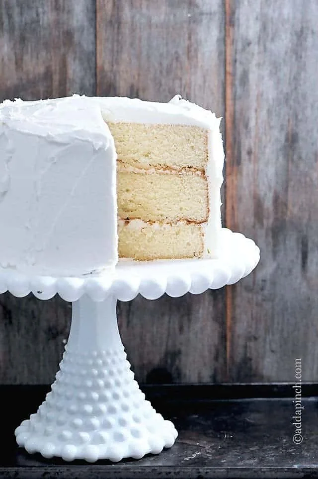 Classic vanilla buttercream frosting spread on a cake