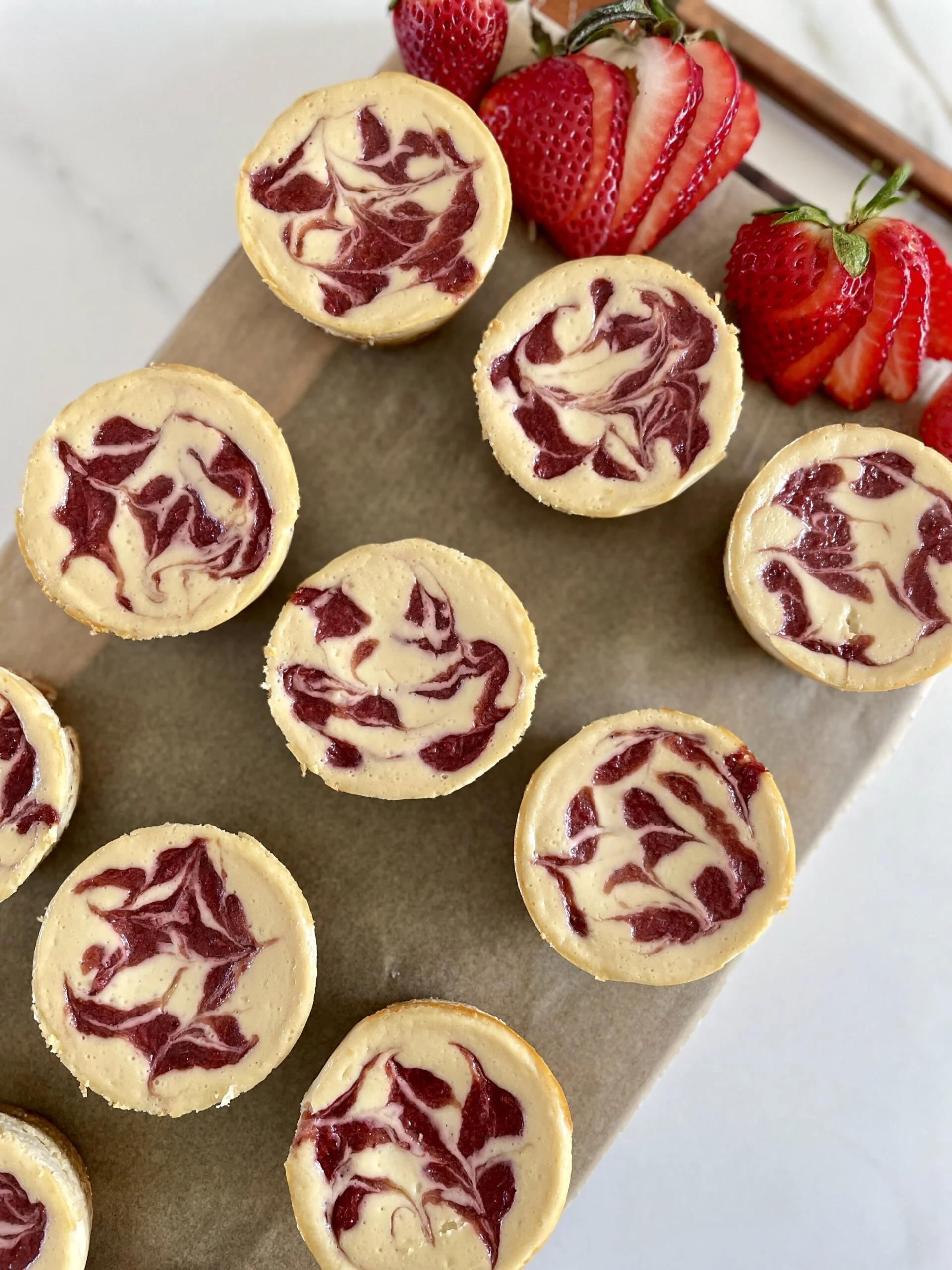 Strawberry Swirl Mini Cheesecakes