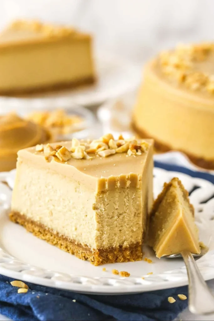 Delicious creamy no-bake peanut butter cheesecake topped with chocolate drizzle.