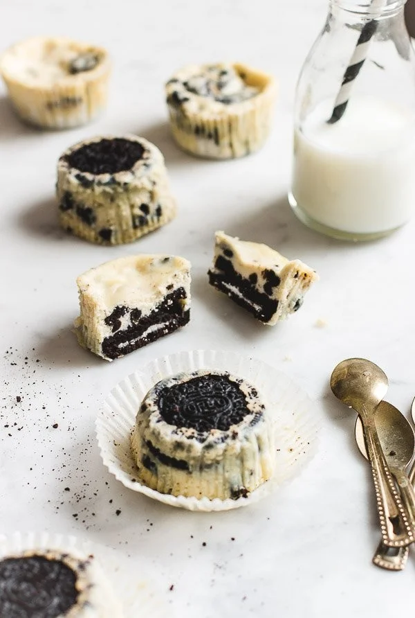 Mini Oreo Cheesecake Cups 4 Mini Oreo Cheesecake Cups topped with crushed Oreos and whipped cream